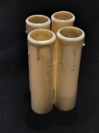 4 fausses bougies tronconiques en plastique crème avec gouttes 100mm